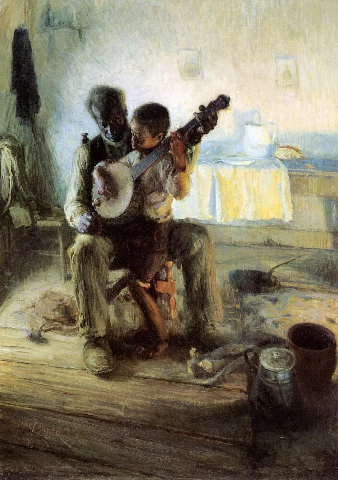 By the light of a fire, an older man sits with a young boy on his knee and guides the boy's hands on a banjo, in a small room with a table and dishes behind them.